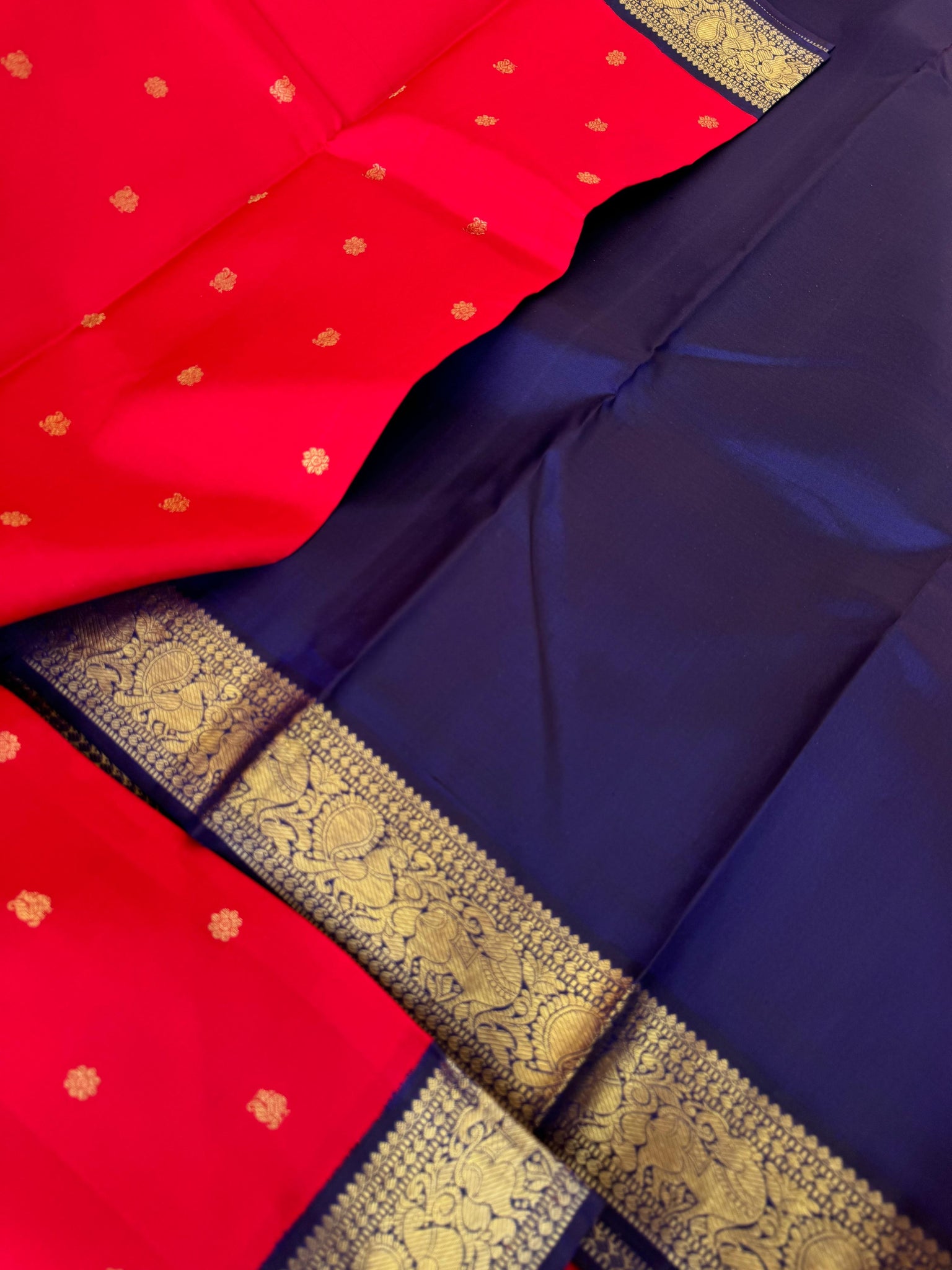 Tales of Korvais Kanchivaram - deep cherry red and navy blue is a vintage age old combination