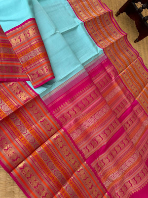 Raga Aadhana - The Vintage Recreated Kanchivaram - stunning pastel baby blue and pink with most traditional korvai woven vaarusai pett borders