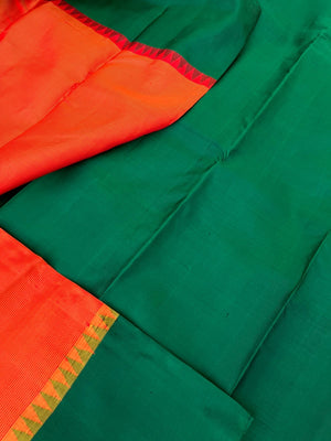 Kaavyam on Korvai Kanchivaram - burnt orange and meenakshi green