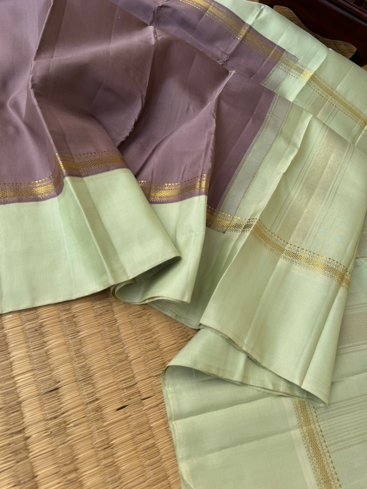 Interesting Kanchivarams - unusual chocolate grey and pastel pista green combination is never seen