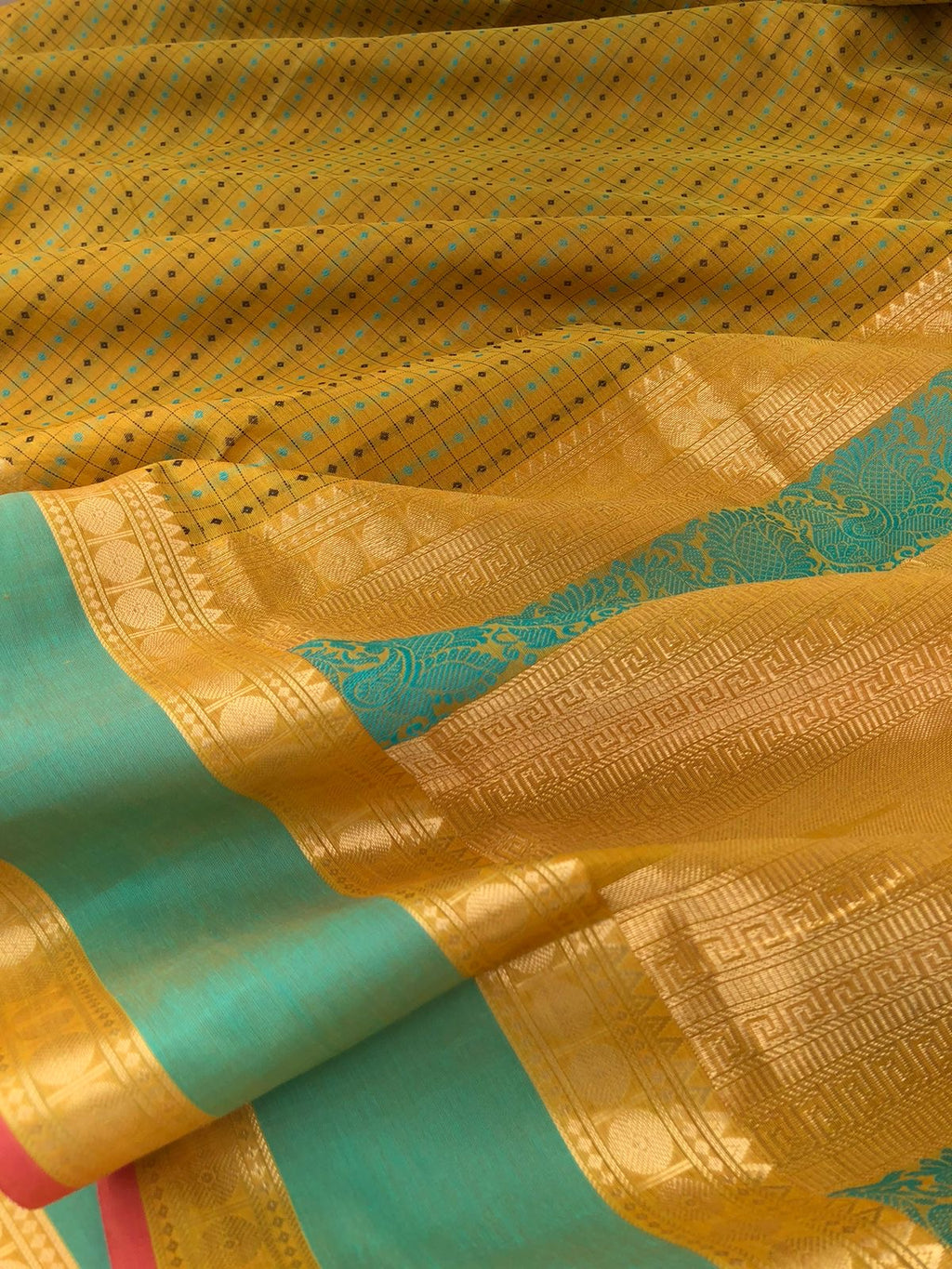 Woven Motifs Silk Cotton - sampanga green Lakshadeepam with retta pett woven borders
