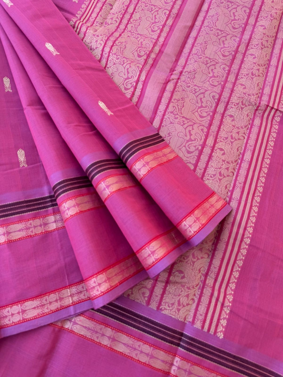 Mangalavastaram - elegant rose pink with fish woven buttas