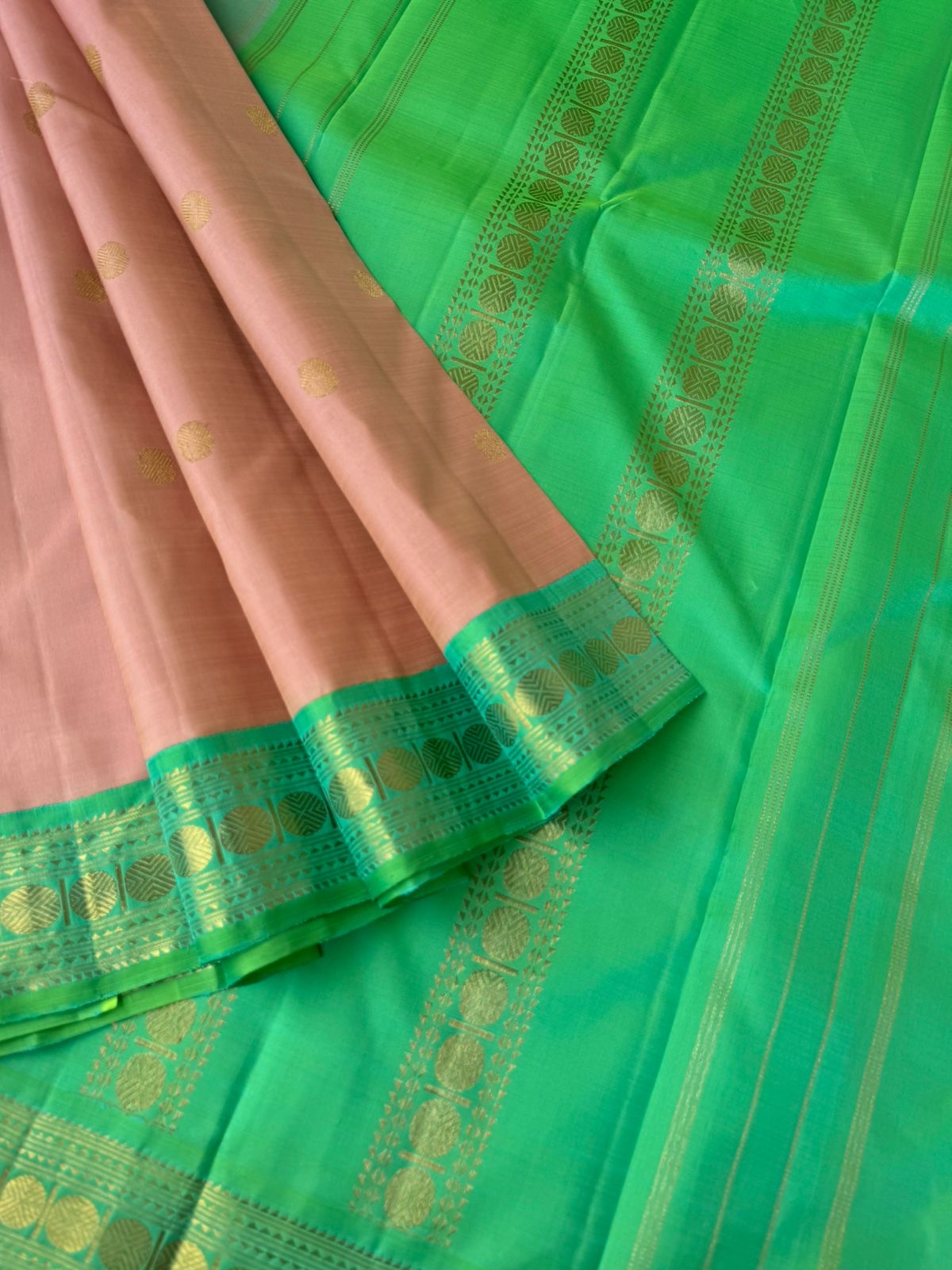 Interesting Kanchivarams - such a stunning rose gold and dual tone aqua green with small korvai woven rudurakasham borders