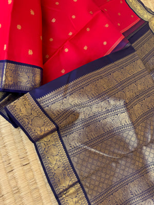 Tales of Korvais Kanchivaram - deep cherry red and navy blue is a vintage age old combination