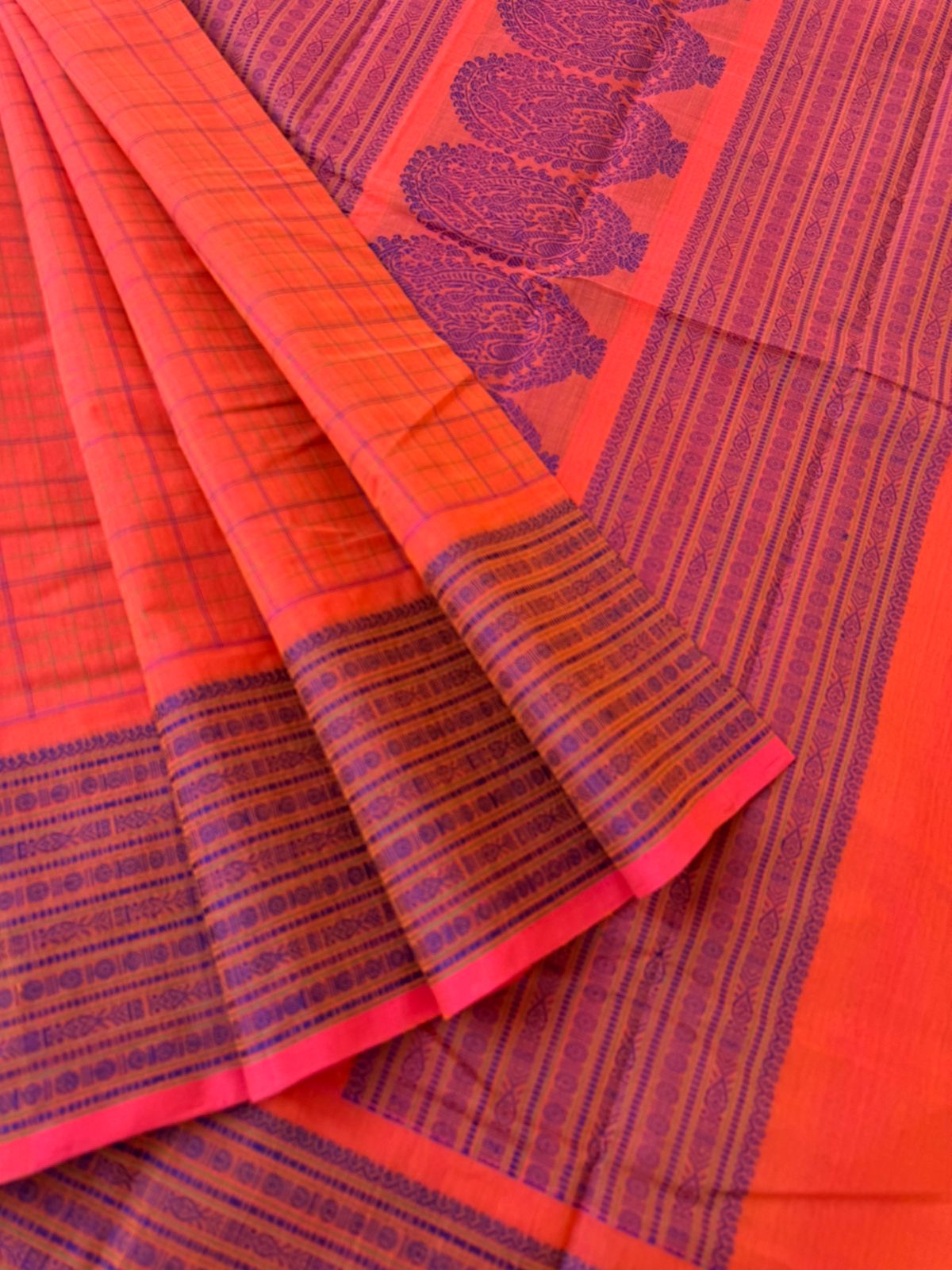 Mangalavastaram - peach orange mixed chex woven body with fish pett woven borders