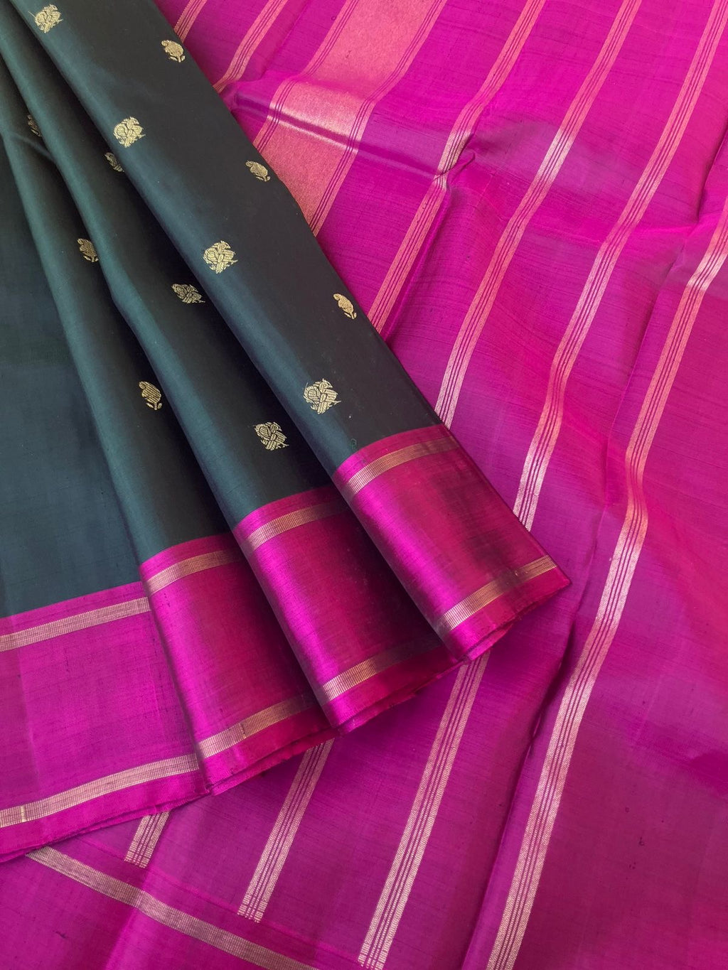 Maaya - Magical Kanchivarams - deep dark forest green and deep pink with Mayil chackaram woven buttas