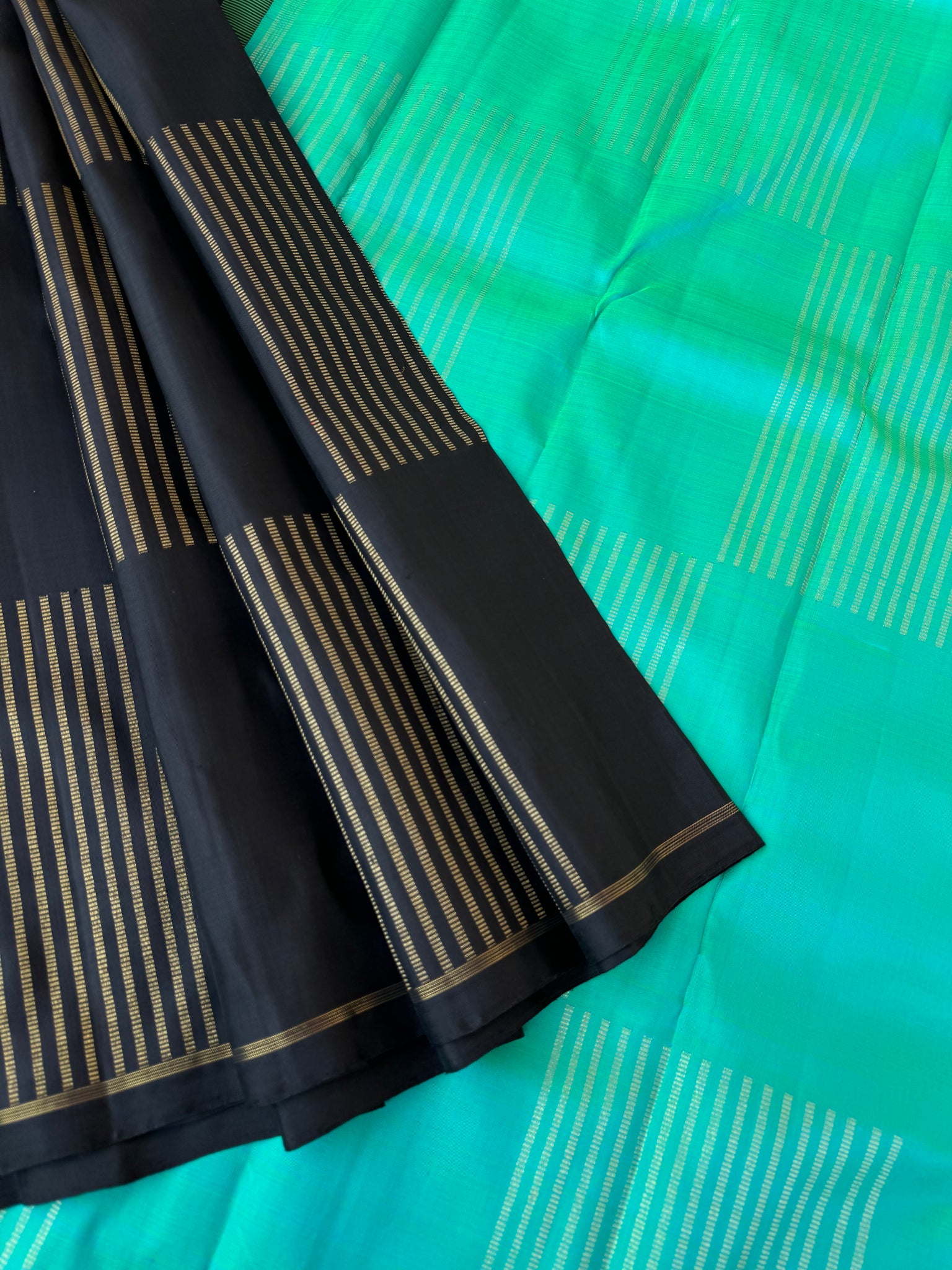 Ragas on Kanchivaram - black and aqua with box chex woven buttas