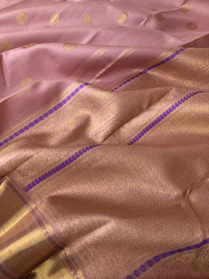 Aarabhi - Amazing Pastel Kanchivarams - stunning dusky rose gold Vairaoosi with solid gold zari woven borders