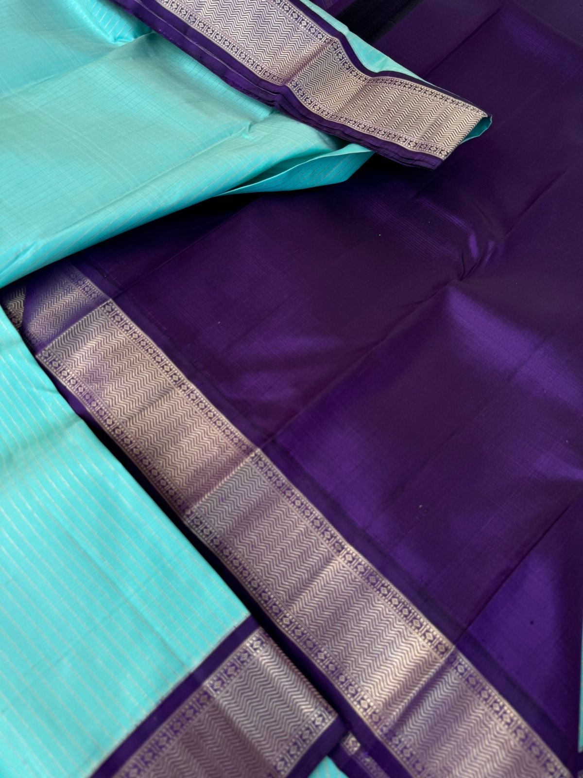 Interesting Kanchivarams - pastel baby blue and deep violet!! Combination made in heaven