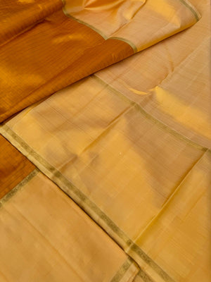 Pastel Ragas on Kanchivaram - deep mustard kattam borders with creamy yellow woven borders