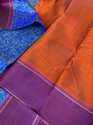 Haritham - Heirloom Yarn Play on Kanchivaram - blue on blue vanasingaram with rust pallu and blouse