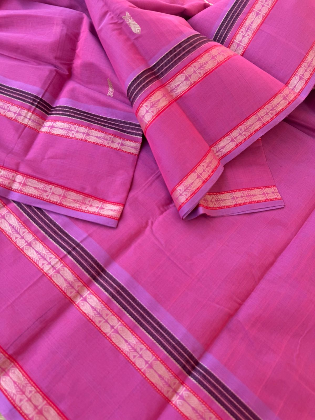 Mangalavastaram - elegant rose pink with fish woven buttas