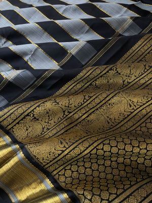 Radhee - Rare Find Kanchivarams - stunning black and grey train track veldhari body with gold zari borders and pallu