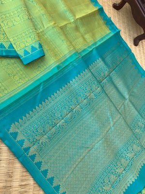 Colour Effects of Kanchivaram - the most beautiful pastel green thread woven varusai pett body with teal zari woven pallu