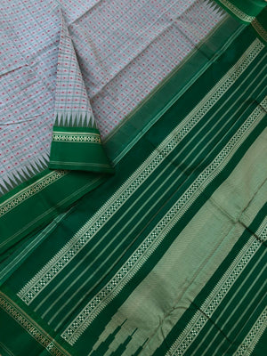 Mira - Our Exclusive Cotton body with Pure Silk Korvai Borders - greyish off white and Meenakshi green Lakshadeepam