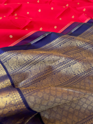 Tales of Korvais Kanchivaram - deep cherry red and navy blue is a vintage age old combination