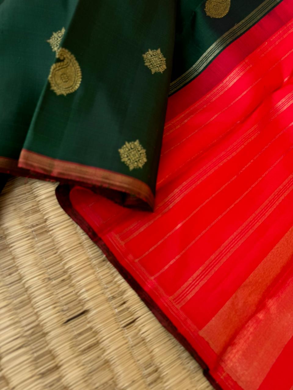 It is all about borderless kanchivarams - deep dark forest green and red