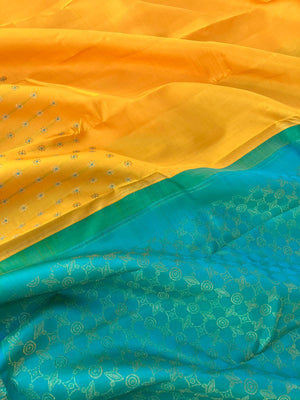 Colour Effects of Kanchivaram - beautiful one of a kind yellow and teal zari woven pallu and blouse with one side meenakarai woven buttas borders with plain body