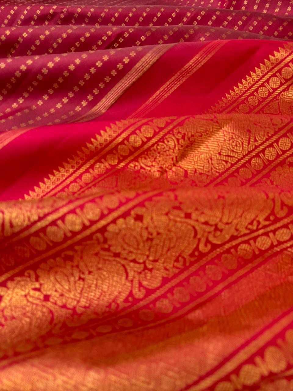 It is all about borderless kanchivarams - reddish maroon with all over tiny buttas