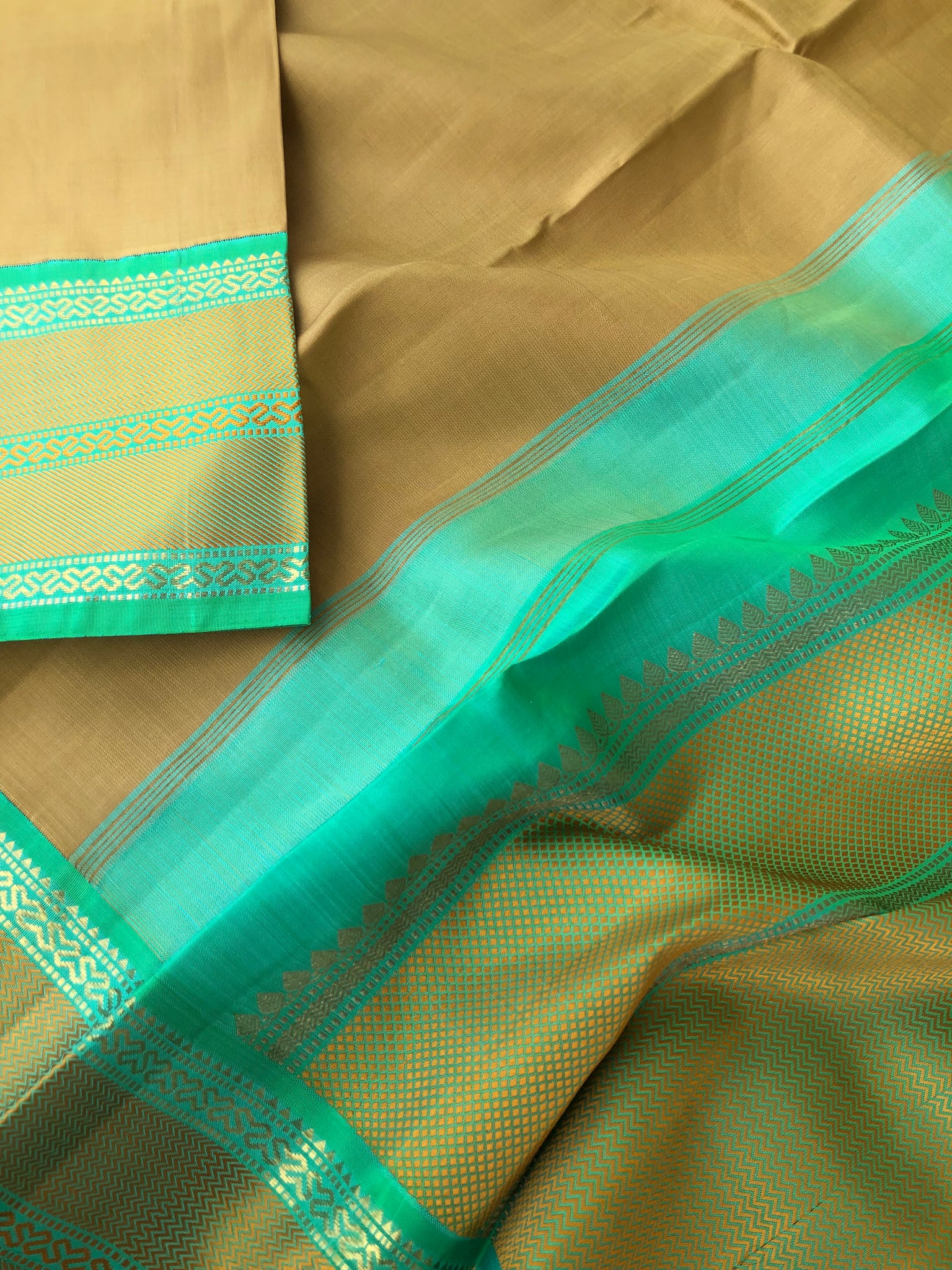 Timeless Classic Kanchivarams - no zari Kanchivaram beauty of beach sand and sandalwood tone and sea green