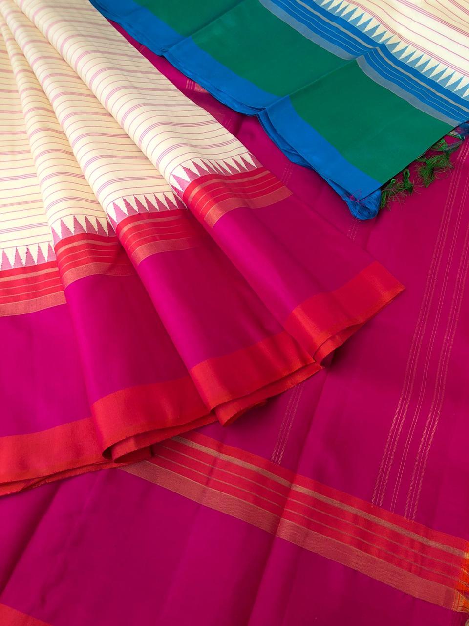 Legacy of Korvai Kanchivaram - stunning off white with pink and green blue ganga jammuna woven borders