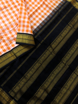 Paalum palamum kattam on Korvai Silk Cotton - off white and orange chexs with black borders pallu and blouse